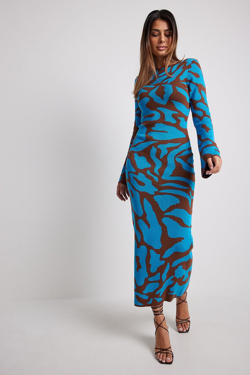 Ava Jacquard Knit Midi Dress" can be rewritten as "Ava Jacquard Knit Mid-Length Dress.