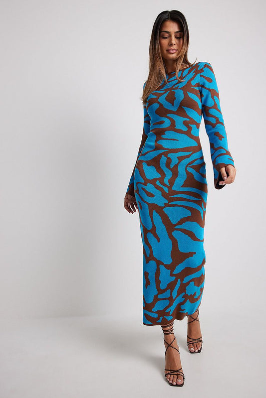 Ava Jacquard Knit Midi Dress" can be rewritten as "Ava Jacquard Knit Mid-Length Dress.