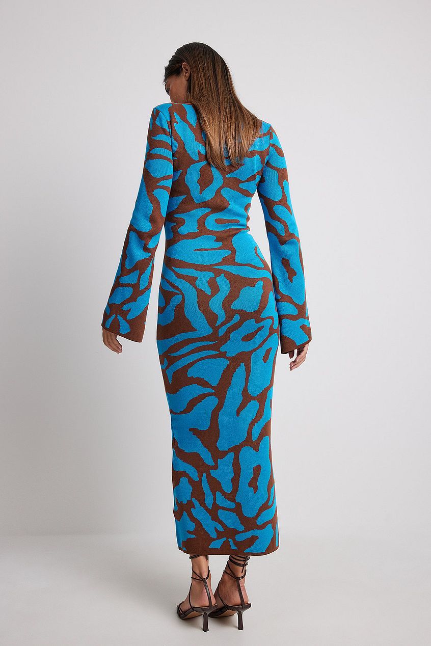 Ava Jacquard Knit Midi Dress" can be rewritten as "Ava Jacquard Knit Mid-Length Dress.
