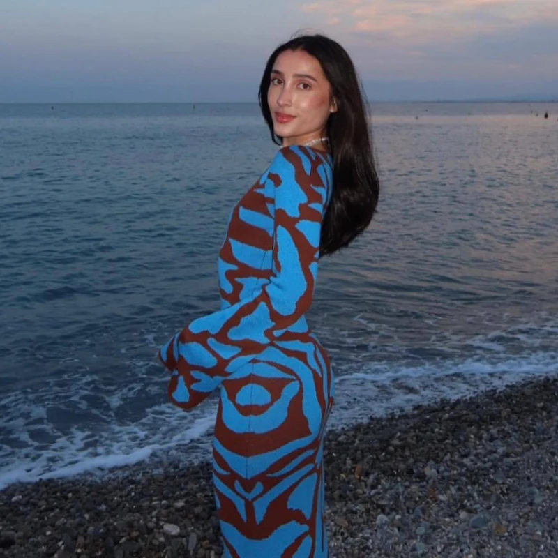 Ava Jacquard Knit Midi Dress" can be rewritten as "Ava Jacquard Knit Mid-Length Dress.