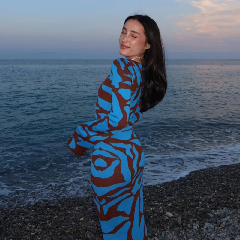 Ava Jacquard Knit Midi Dress" can be rewritten as "Ava Jacquard Knit Mid-Length Dress.